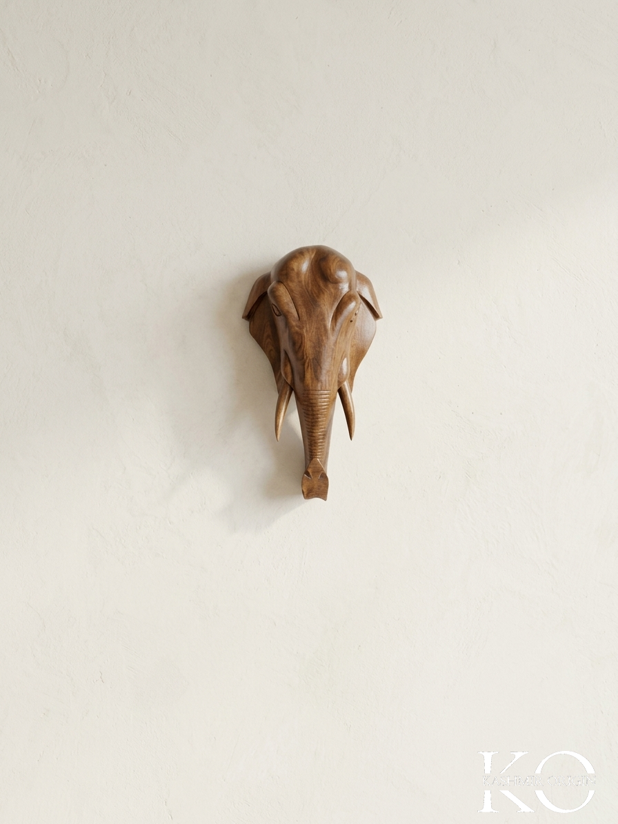 Walnut wood elephant head showpiece, side angle