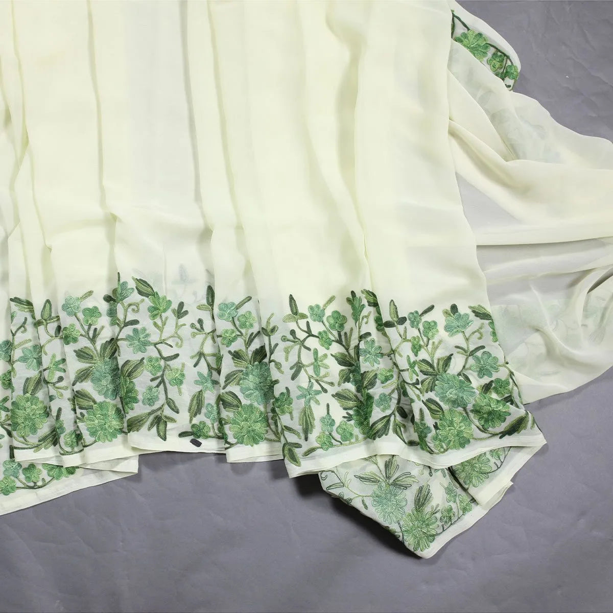Light Green Base Aari Embroidered Georgette Saree