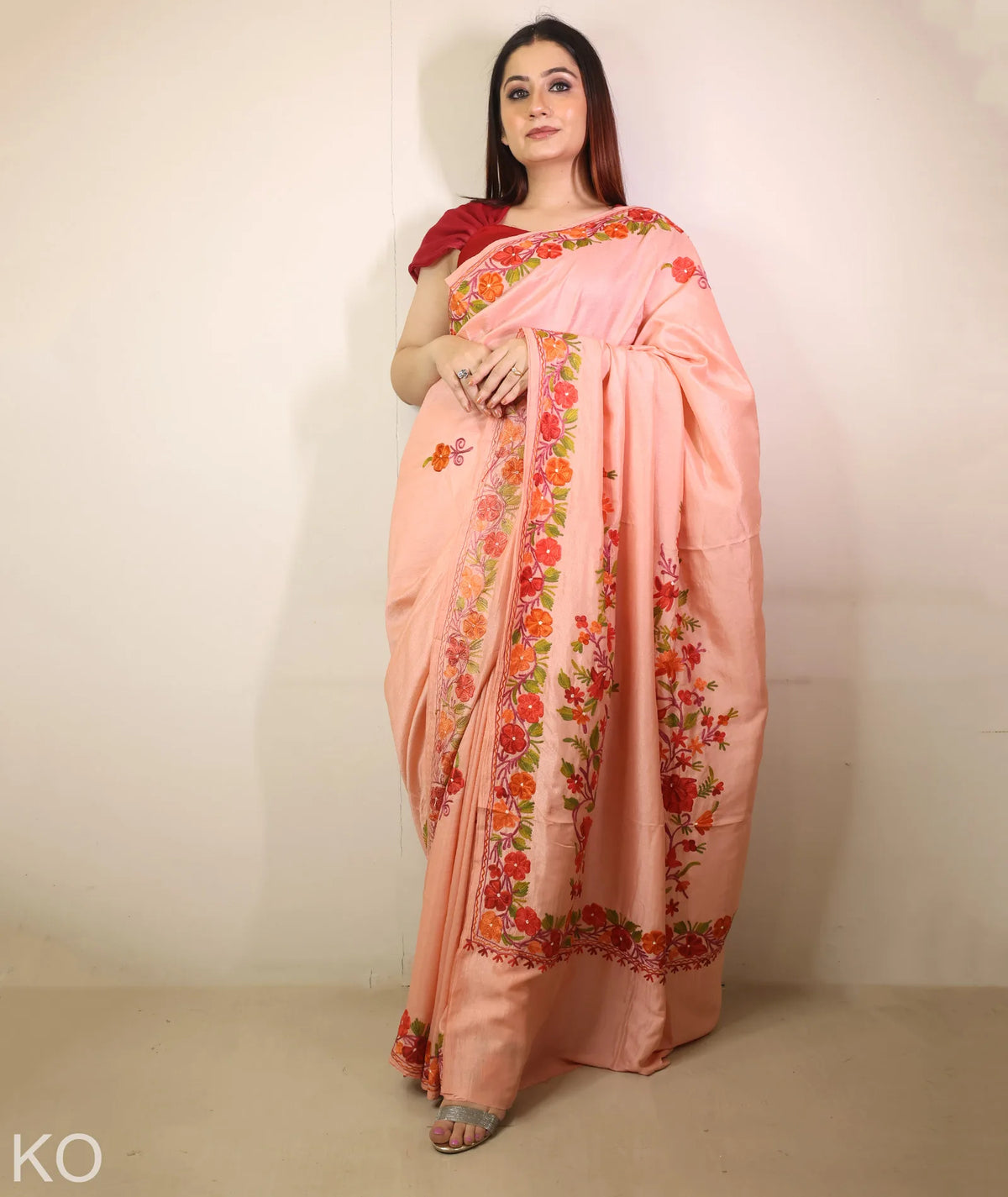Peach Embroidered Creape Saree