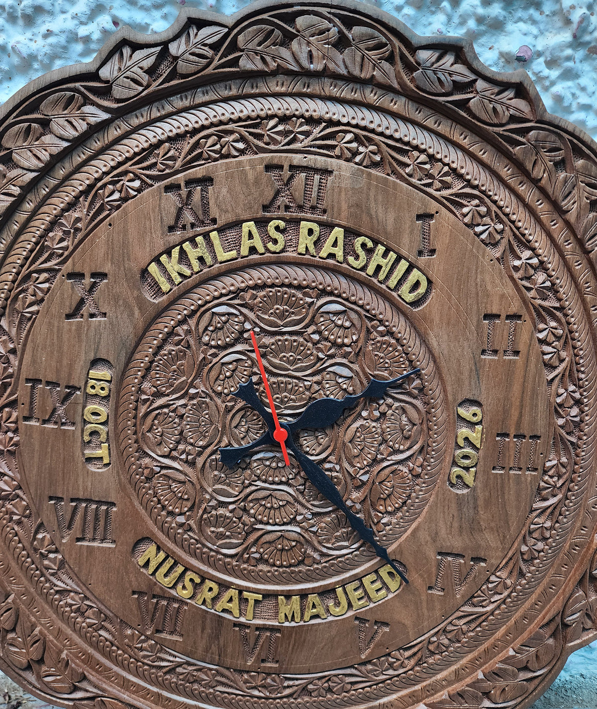 Hand carved Kashmiri walnut wood wall clock with custom names