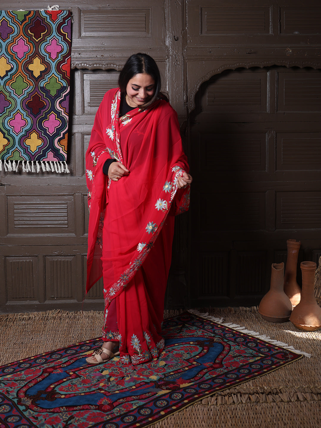 Crimson Georgette Saree with Sage Aari Floral Vines