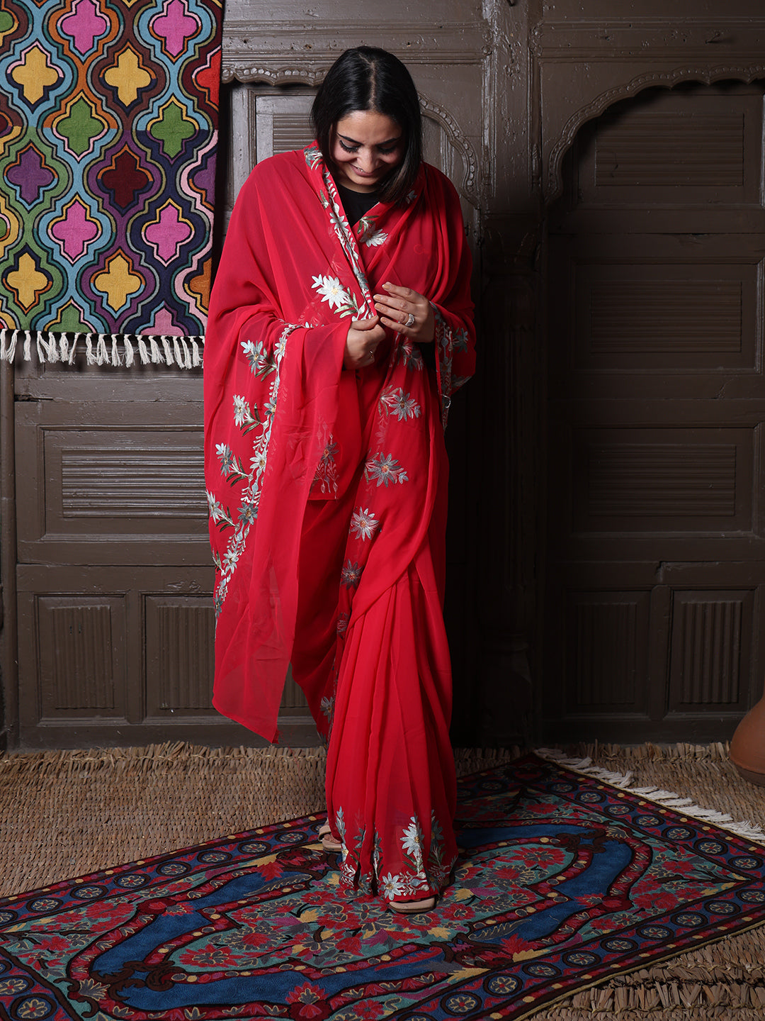 Crimson Georgette Saree with Sage Aari Floral Vines