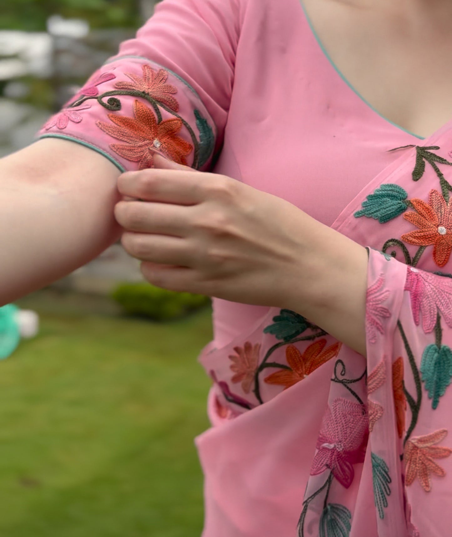 Baby Pink Floral Design Aari Embroidered Georgette Saree